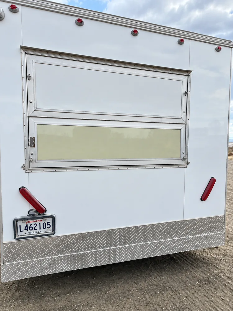 Mobile kitchen trailer exterior service window
